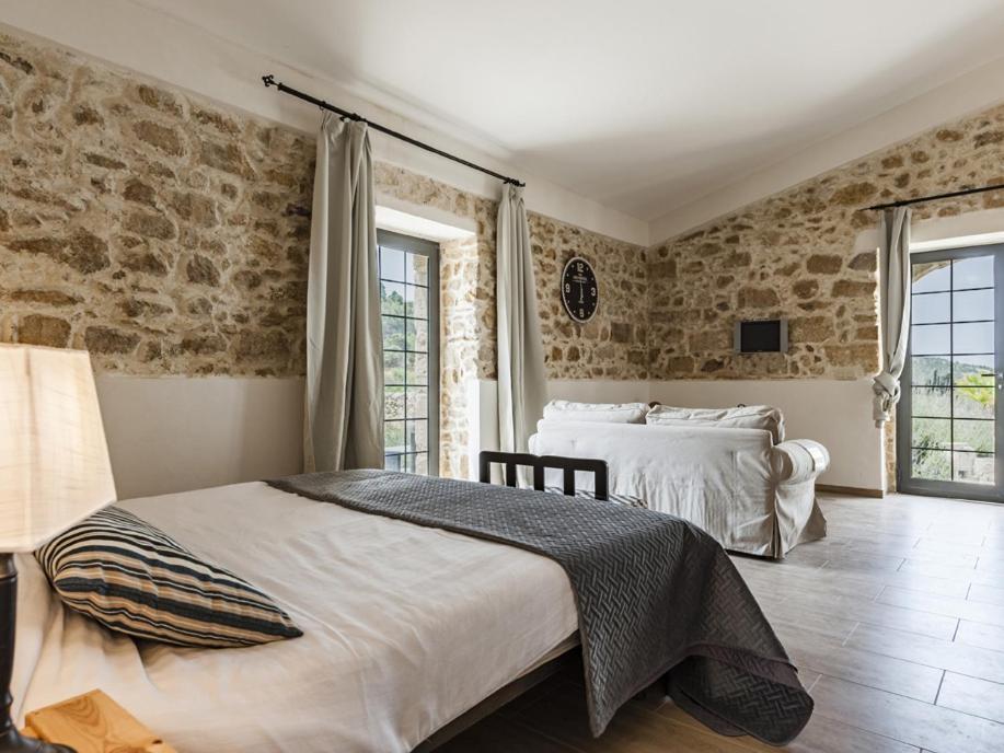 Отель Bramasole Charming House Комизо Экстерьер фото